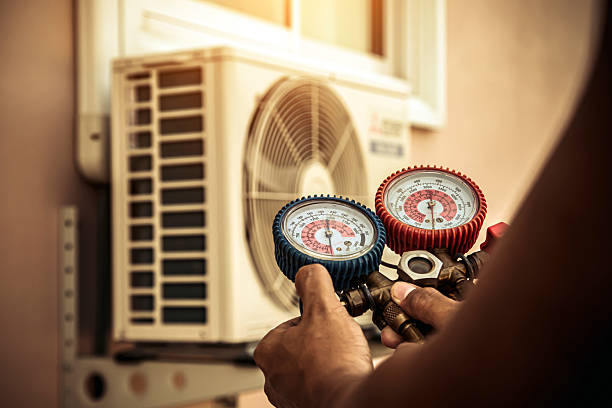 Professional Heat Pump Repair technician working in Cornish, ME